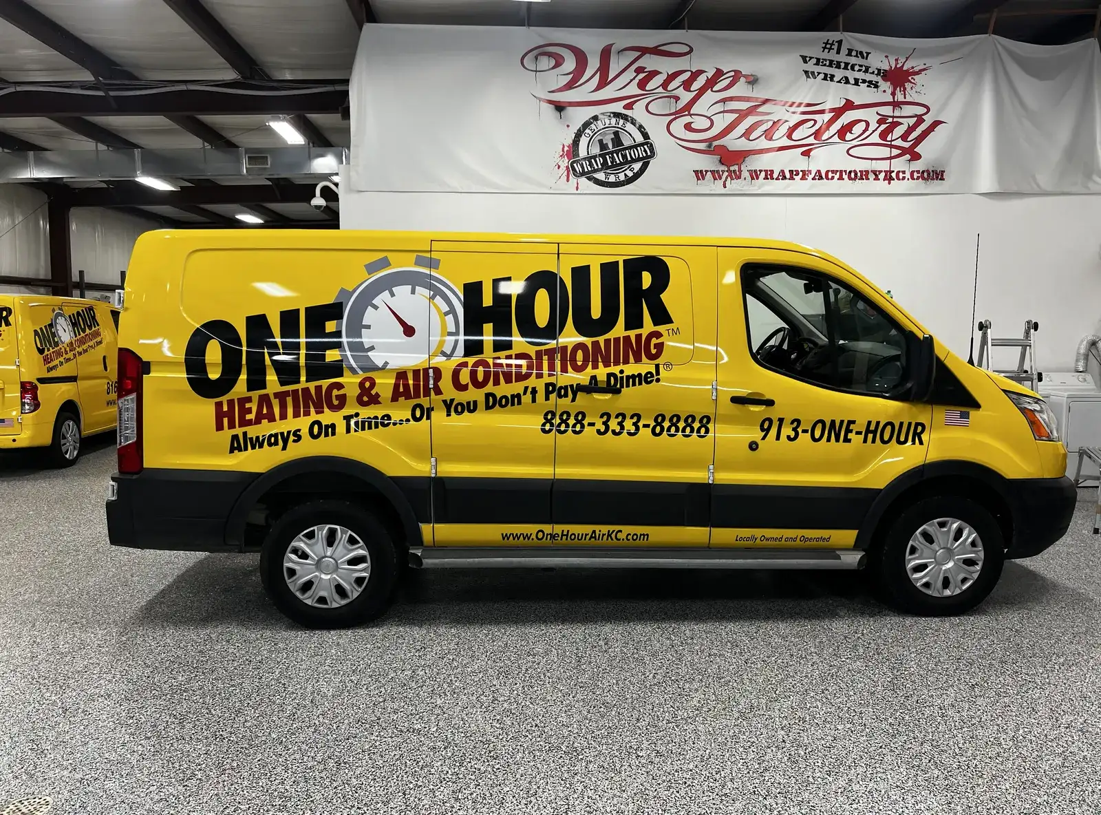 One Hour fleet van in the shop — Ford Transit