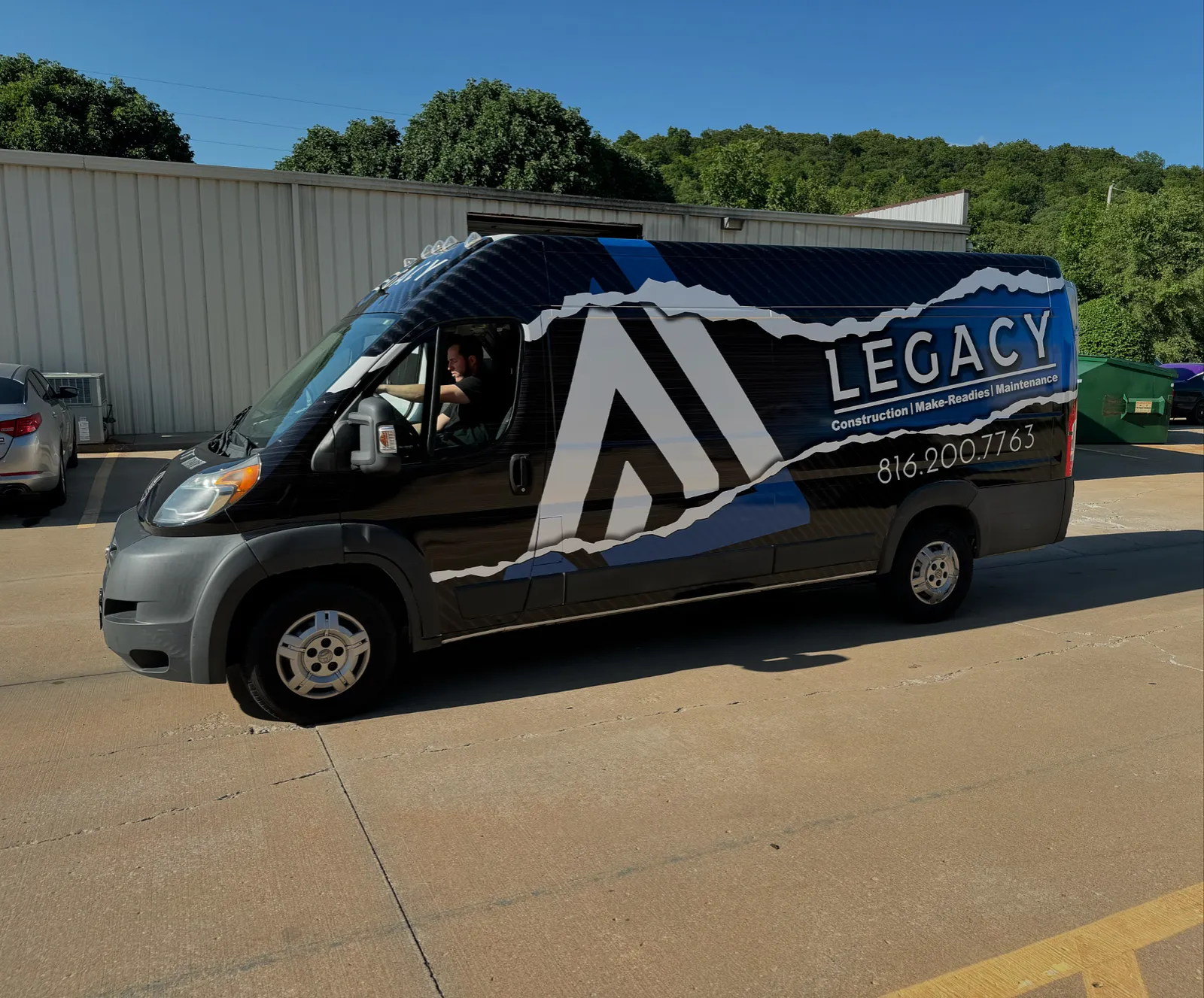 Full brand wrap, mountain graphics — Ford Transit Connect